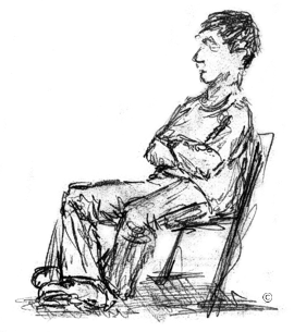 Robert sitzt Pose